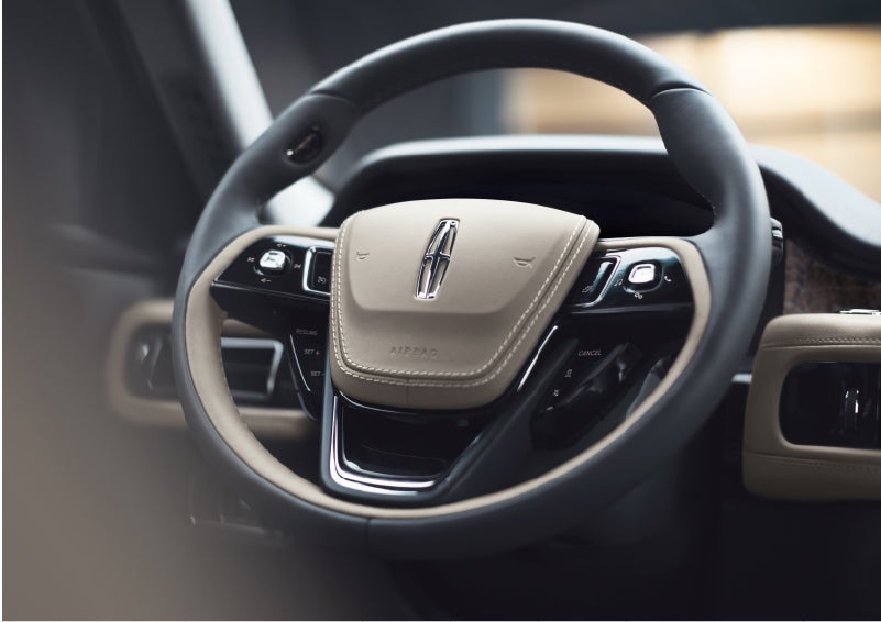 The intuitively placed controls of the steering wheel on a 2023 Lincoln Aviator® SUV | Dorsch Lincoln in Green Bay WI