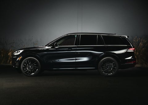 A 2024 Lincoln Aviator® SUV is shown in the Infinite Black exterior color | Dorsch Lincoln in Green Bay WI