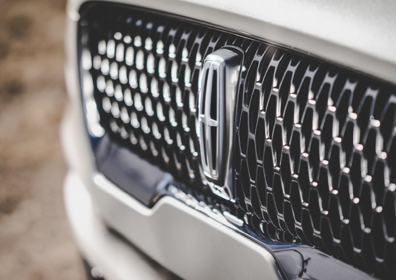 The grille of the 2024 Lincoln Aviator® Reserve model with an eye-catching repeated field of Lincoln Star logo shapes | Dorsch Lincoln in Green Bay WI