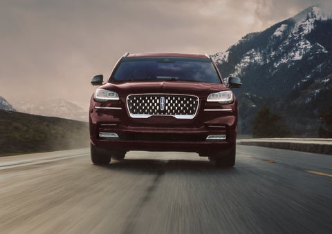A 2024 Lincoln Aviator® SUV is shown in the Diamond Red exterior color. | Dorsch Lincoln in Green Bay WI
