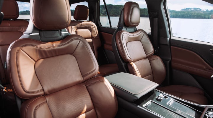 The front row's Perfect Position Seats in a 2024 Lincoln Aviator® Reserve model with Ebony Roast interior | Dorsch Lincoln in Green Bay WI
