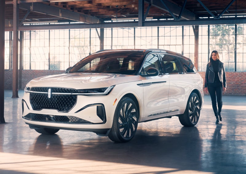 A person approaches a 2024 Lincoln Nautilus® SUV. | Dorsch Lincoln in Green Bay WI