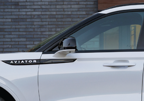 The driver’s door of a white 2025 Lincoln Aviator® SUV is showcased. | Dorsch Lincoln in Green Bay WI