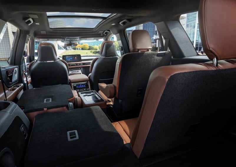 The interior of the 2025 Lincoln Aviator® SUV is shown with two seats folded down for added space. | Dorsch Lincoln in Green Bay WI