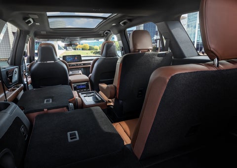 The interior of the 2025 Lincoln Aviator® SUV is shown with two seats folded down for added space. | Dorsch Lincoln in Green Bay WI