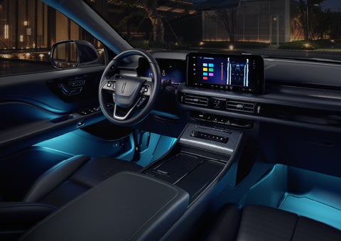 Deep blue Ambient Lighting glows from various places within a 2026 Lincoln Aviator® SUV. | Dorsch Lincoln in Green Bay WI