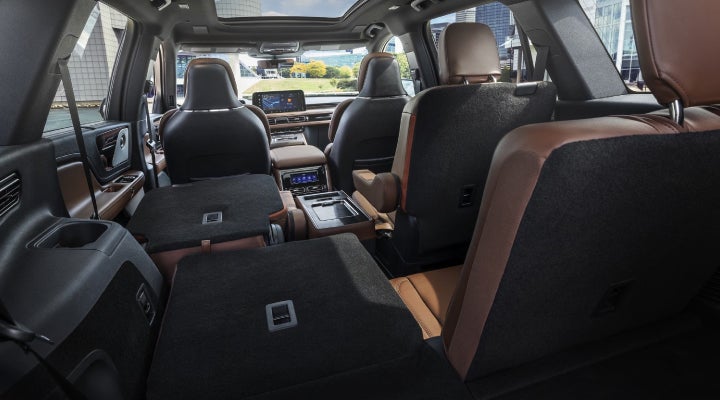 One side of the PowerFold® third-row seat and a second-row seat are folded forward in the 2026 Lincoln Aviator® SUV. | Dorsch Lincoln in Green Bay WI
