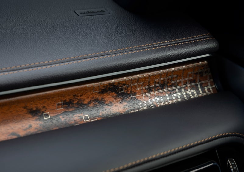 A close-up shot of the 2026 Lincoln Aviator® dashboard with unique black and brown accents and brown stitching. | Dorsch Lincoln in Green Bay WI