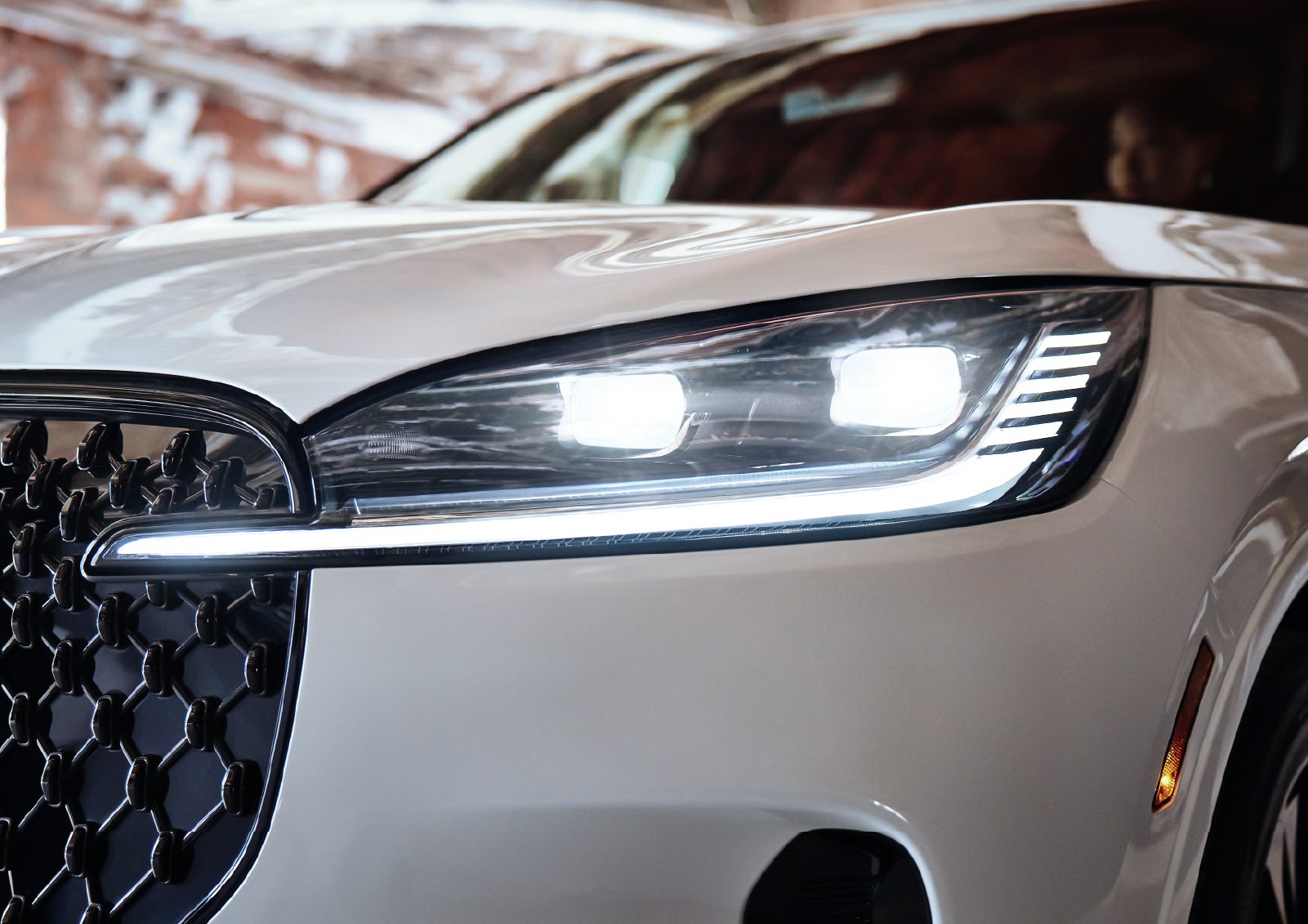 A close-up of a headlamp on the 2027 Lincoln Aviator® SUV is shown. | Dorsch Lincoln in Green Bay WI