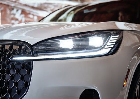 A close-up of a headlamp on the 2027 Lincoln Aviator® SUV is shown. | Dorsch Lincoln in Green Bay WI